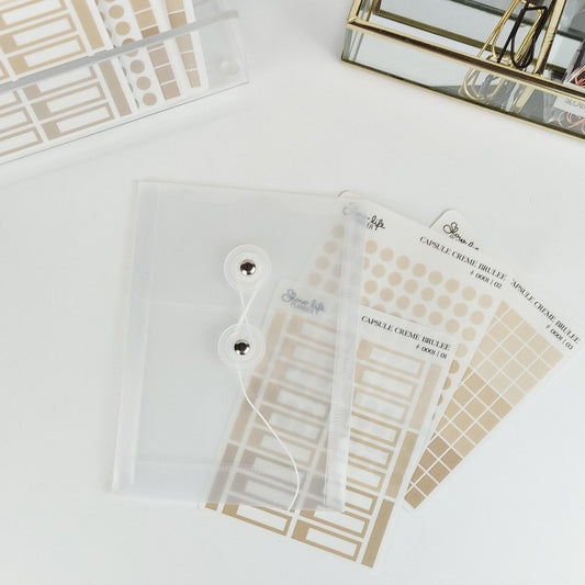 Pochette transparente fermeture à oeillets